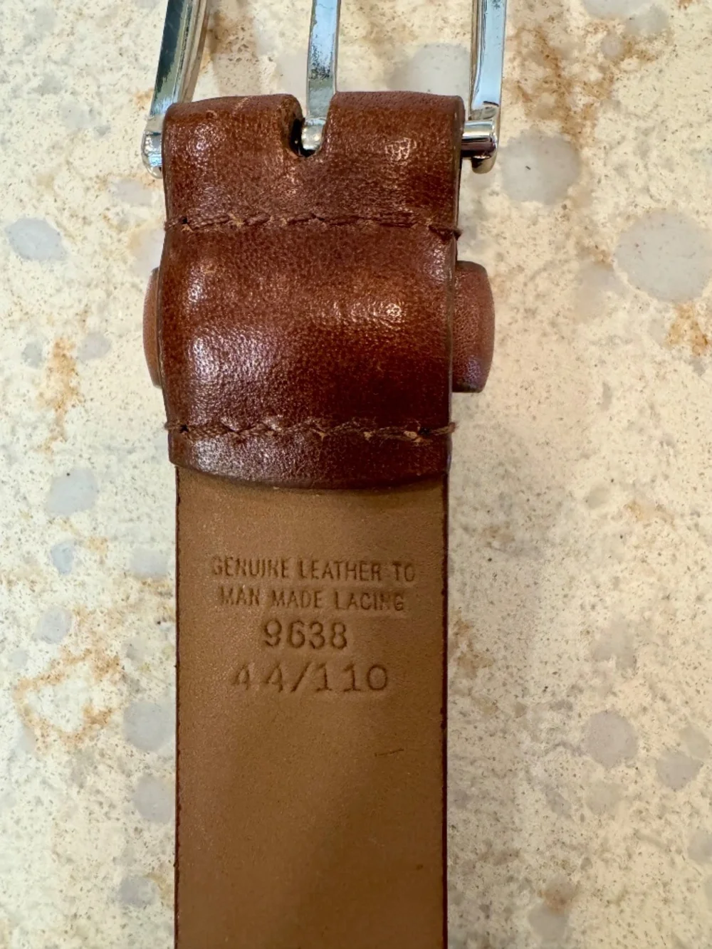Men's size 44 100% unique leather belt by George, silver metal buckle.